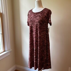 LuLaRoe Carly NWT. Buttery soft. Pocket. Size Small SM S